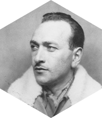 Black and white photo of Michel Thomas who started to develop a unique method for learning languages in his youth during the World War in Europe.